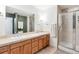 Modern bathroom with dual vanity and large walk-in shower at 1630 N Clarkson St # 320, Denver, CO 80218
