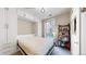 Guest bedroom with a comfortable bed and built-in storage at 1630 N Clarkson St # 320, Denver, CO 80218