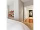 Main bedroom with access to hall bathroom and closets at 1630 N Clarkson St # 320, Denver, CO 80218
