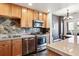 Updated kitchen, granite countertops, stainless steel appliances at 1630 N Clarkson St # 320, Denver, CO 80218
