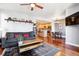 Open living space with hardwood floors and city views at 1630 N Clarkson St # 320, Denver, CO 80218