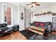 Living room with hardwood floors, mid-century modern furniture at 1630 N Clarkson St # 320, Denver, CO 80218