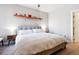 Spacious bedroom with neutral decor and ample natural light at 1630 N Clarkson St # 320, Denver, CO 80218