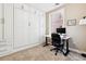 Home office with built-in cabinetry and window views at 1630 N Clarkson St # 320, Denver, CO 80218