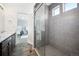 Bathroom features glass enclosed shower with updated tile at 20054 E 48Th Dr, Denver, CO 80249