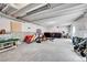 Unfinished basement offering potential for customization, featuring concrete floors and open layout at 3086 Kestrel St, Brighton, CO 80601