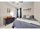 Well-decorated ' bedroom with a bed, dresser, and playful accents, creating a fun and inviting atmosphere at 3086 Kestrel St, Brighton, CO 80601
