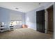 Light and airy bedroom with built-in shelving at 4942 S Zephyr St, Littleton, CO 80123