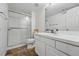 Clean bathroom with glass enclosed shower and neutral vanity at 12610 E Wesley Pl, Aurora, CO 80014