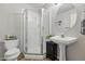 Clean bathroom featuring a modern vanity and walk-in shower at 12610 E Wesley Pl, Aurora, CO 80014