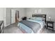 Cozy bedroom featuring a comfortable bed, neutral decor, and plenty of natural light at 12610 E Wesley Pl, Aurora, CO 80014