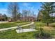 Community park features a walking path, trees, and seating for residents at 12610 E Wesley Pl, Aurora, CO 80014