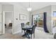Bright dining area with sliding glass doors leading to the backyard at 12610 E Wesley Pl, Aurora, CO 80014