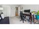 Functional home office space with a desk and comfortable seating at 12610 E Wesley Pl, Aurora, CO 80014