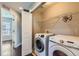 Laundry room with new washer and dryer at 14183 Madison Way, Thornton, CO 80602