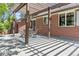 Outdoor patio with a pergola and dining set perfect for relaxation and entertaining at 1475 Kingsbury Ct, Golden, CO 80401