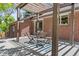 Outdoor patio with a pergola and dining set perfect for relaxation and entertaining at 1475 Kingsbury Ct, Golden, CO 80401