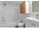 Clean bathroom with white tile, modern vanity, and updated hardware at 19551 E Mann Creek Dr # B, Parker, CO 80134