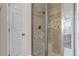 Modern bathroom showcasing glass shower, tile accents, and vanity at 19551 E Mann Creek Dr # B, Parker, CO 80134