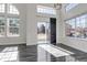 Bright dining area features a glass sliding door to the deck and plenty of natural light at 19551 E Mann Creek Dr # B, Parker, CO 80134
