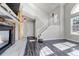 Bright entryway features soaring ceilings, stairs to the second level, and beautiful hardwood floors at 19551 E Mann Creek Dr # B, Parker, CO 80134