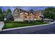Charming townhome featuring stone accents and a welcoming front porch perfect for relaxing at 19551 E Mann Creek Dr # B, Parker, CO 80134