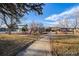 Community park featuring playground equipment, picnic tables, and walking path for leisure and recreation at 19551 E Mann Creek Dr # B, Parker, CO 80134