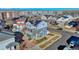 Beautiful aerial view of modern homes, community, and mountain backdrop at 5295 Andes St, Denver, CO 80249