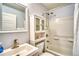 Clean and functional bathroom with a sink, toilet, and bathtub shower combo at 5295 Andes St, Denver, CO 80249