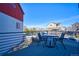 Outdoor deck area with seating, offering scenic neighborhood views at 5295 Andes St, Denver, CO 80249