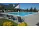 Community swimming pool featuring clear blue water and ample seating around the pool deck at 1378 S Duquesne Ct, Aurora, CO 80018