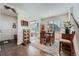 Cozy dining area with sliding glass doors, a modern light fixture, and a charming decor at 1378 S Duquesne Ct, Aurora, CO 80018