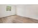 Cozy bedroom featuring sleek flooring and a window that provides a generous amount of natural light at 2750 S Rifle St, Aurora, CO 80013