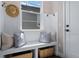 Charming mudroom features a built-in bench with storage, decorative pillows, and a stylish hat rack at 2144 Bellcove Dr, Castle Pines, CO 80108