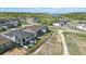 A modern home featuring a backyard oasis with a patio, hot tub, and fenced yard in a picturesque community at 2144 Bellcove Dr, Castle Pines, CO 80108