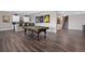 Spacious recreation room featuring a pool table, bar area, and hardwood floors, perfect for entertaining at 2144 Bellcove Dr, Castle Pines, CO 80108