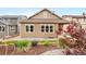Beautiful home with a landscaped backyard and stone accents at 9781 Eagle River St, Littleton, CO 80125
