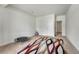 Finished basement bedroom with carpet, window, and plenty of space at 1075 Whitekirk Pl, Castle Rock, CO 80104