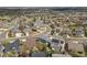 Aerial view showcasing the neighborhood featuring mature trees, well-maintained homes and a quiet cul-de-sac at 3475 Golden Spur Loop, Castle Rock, CO 80108