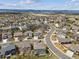 Aerial view of a neighborhood showcasing well-maintained homes and landscaping at 3475 Golden Spur Loop, Castle Rock, CO 80108