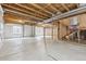 Spacious unfinished basement with concrete floor and framed in stairs at 3475 Golden Spur Loop, Castle Rock, CO 80108