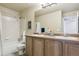 Bathroom featuring a double sink vanity and shower/tub combination at 3475 Golden Spur Loop, Castle Rock, CO 80108