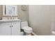 Powder room with white vanity, updated fixtures and a modern design at 3475 Golden Spur Loop, Castle Rock, CO 80108