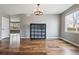 Dining room with hardwood floors, natural light, and neutral walls at 3475 Golden Spur Loop, Castle Rock, CO 80108
