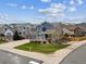 Beautiful two-story home with a three-car garage, front porch, and well-manicured lawn at 3475 Golden Spur Loop, Castle Rock, CO 80108