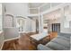 Open-concept living area with hardwood floors and natural light throughout the home at 3475 Golden Spur Loop, Castle Rock, CO 80108