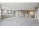 Spacious, carpeted room with a high ceiling and ample natural light at 3475 Golden Spur Loop, Castle Rock, CO 80108