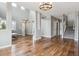 Spacious living area with hardwood floors, high ceilings, and staircase access at 3475 Golden Spur Loop, Castle Rock, CO 80108