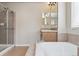 Main bathroom with soaking tub and walk-in shower at 3475 Golden Spur Loop, Castle Rock, CO 80108