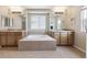 Soaking tub with tile surround and dual sink vanity at 3475 Golden Spur Loop, Castle Rock, CO 80108